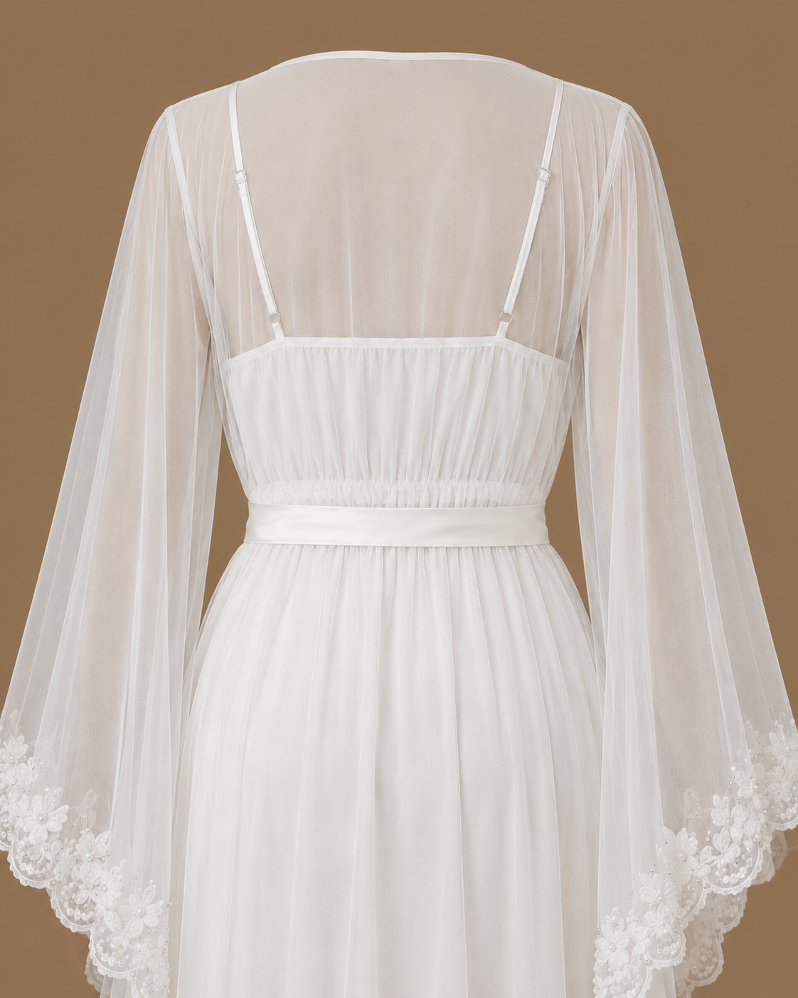 Close-up back view of the AHLAM bridal set showing the satin underdress straps, sheer tulle kimono and embellished sleeves