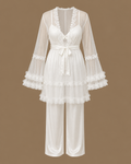 Front view of the CHAIMAE ivory four-piece bridal lounge set with a sheer tulle top, ruffled sleeves and satin trousers