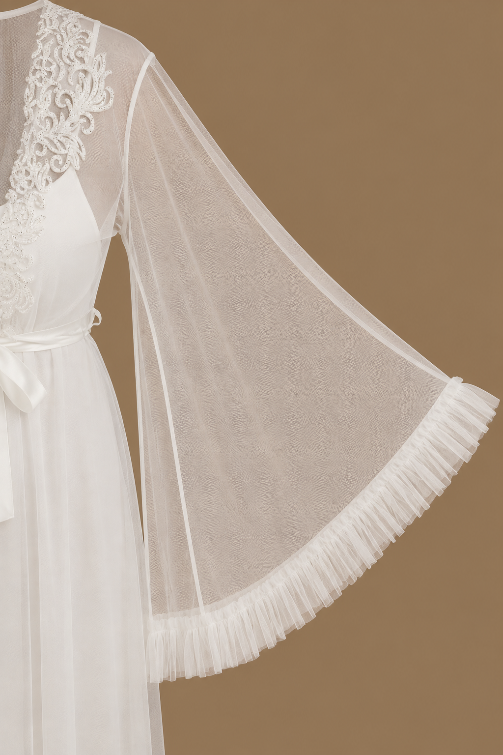 Close-up of the MAYSA bridal robe’s flowing sheer tulle sleeve with soft ruffled trim