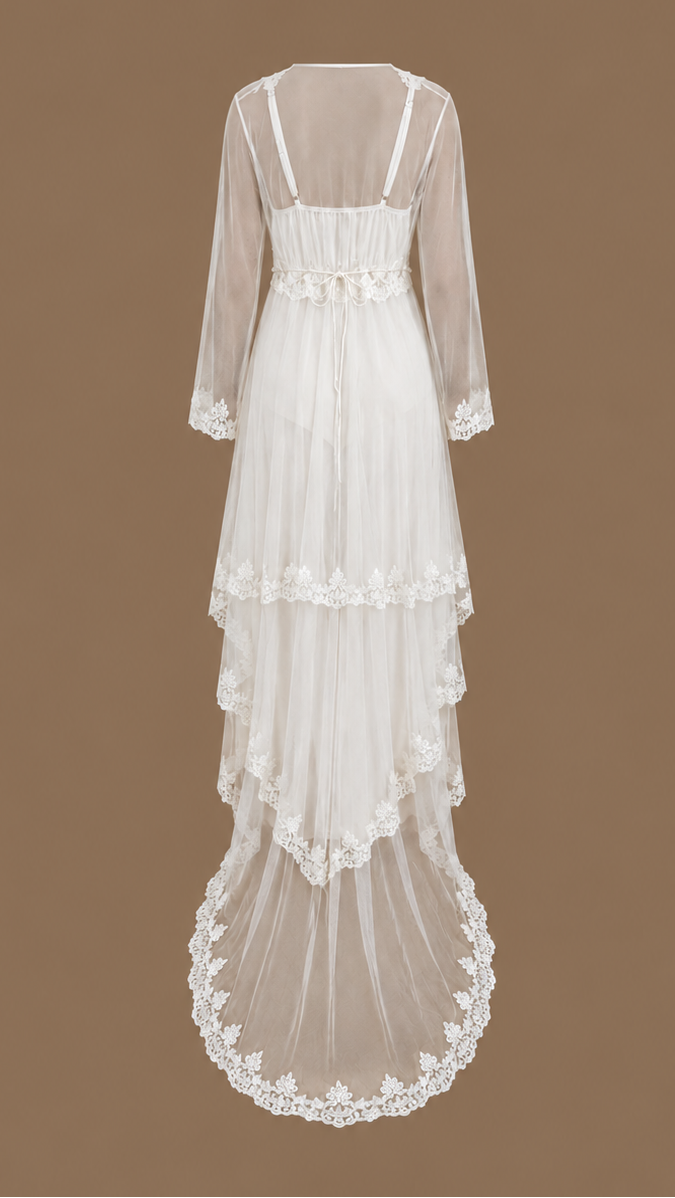Back view of the SABAH ivory four-piece bridal set with layered sheer tulle, lace detailing and a subtle train