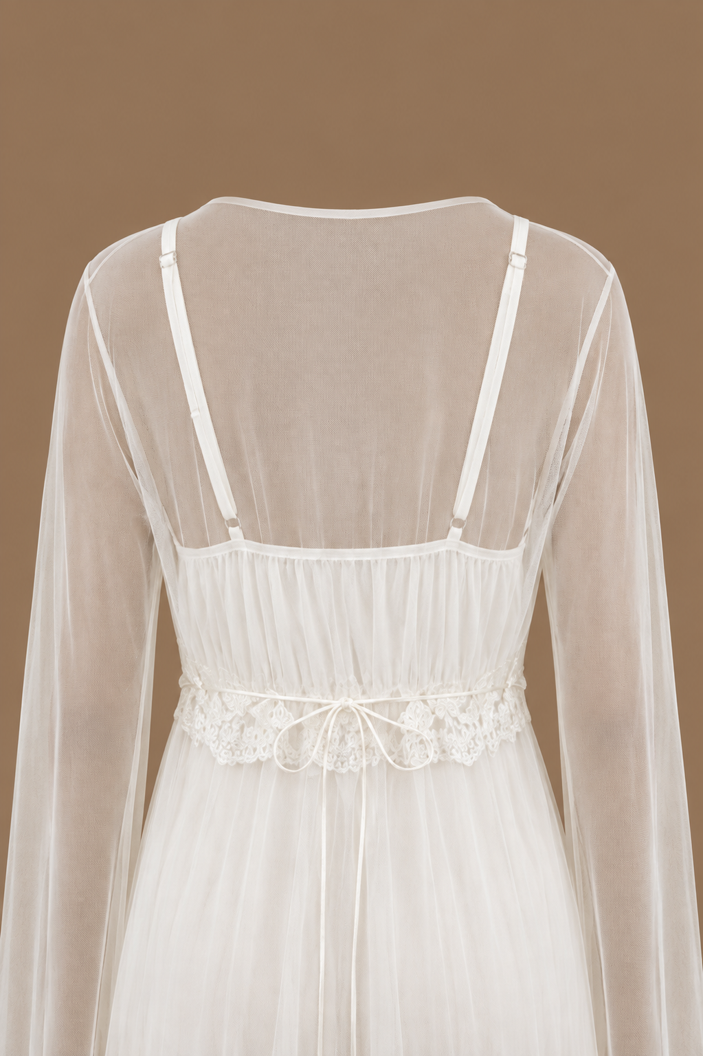 Close-up back view of the SABAH ivory bridal set showing sheer tulle, satin straps and delicate lace waist detailing