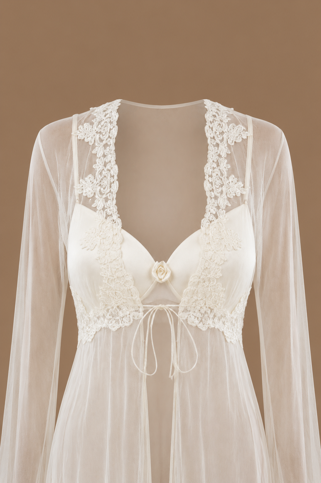 Close-up front view of the SABAH ivory bridal set showing sheer tulle, lace-trimmed neckline and satin bodice detailing
