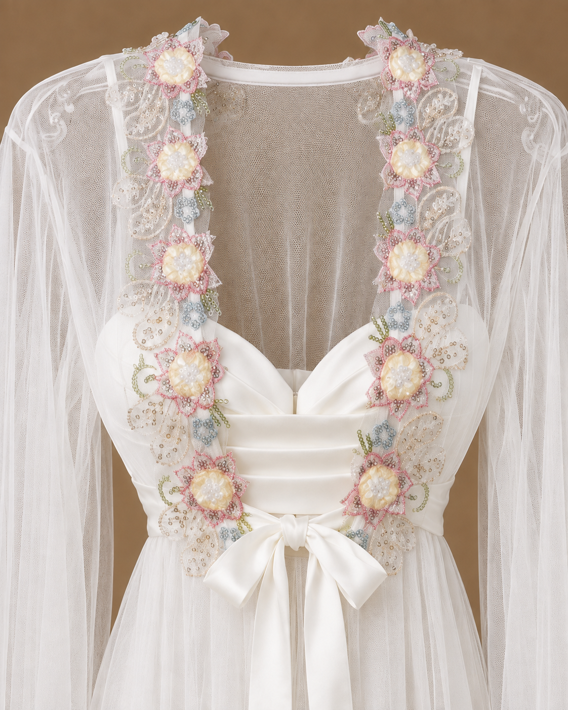 Front detail of the SABRINE ivory bridal set with satin dress, sheer tulle kimono and pastel floral embroidery
