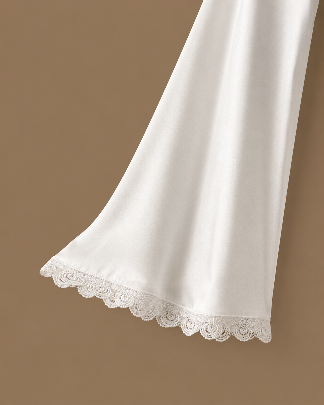 Fabric detail of the SANAE ivory satin bridal kimono with delicate lace-trimmed sleeve